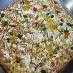 A picture of Dry fruit cake made by suji (semolina).