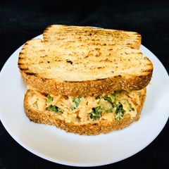 A picture of Chickpeas and vegetables sandwich.