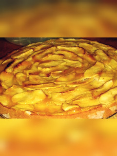 Una foto de Bizcocho con manzanas
