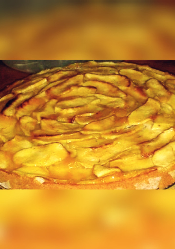 Una foto de Bizcocho con manzanas