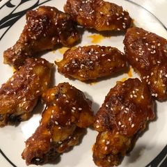 A picture of Baked Sticky Honey Garlic Sriracha Wings.