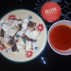 A picture of Roasted yam and palm oil.
