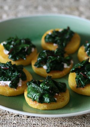 A picture of Polenta with goat cheese + greens.
