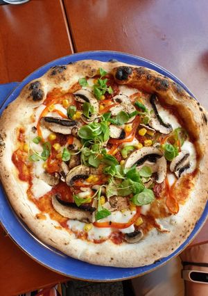 Una foto de Pizza Vegetal