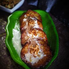 A picture of Walnut Rabdi Malpua.