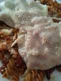 Espirales con carne y queso gratinado