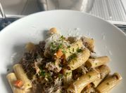 A picture of rigatoni with sausage