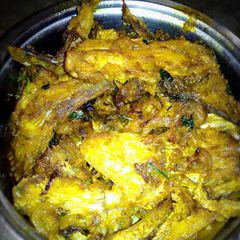 A picture of Bhetki fish head and bones stir fry.
