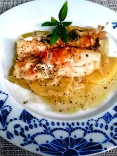 Una foto de Merluza al horno con patatas