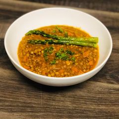 A picture of Carrot and Brown Lentil Soup with Ground Egusi and Bherebhere Spice.