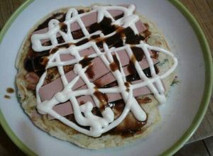 Una foto de Okonomiyaki お好みやき
