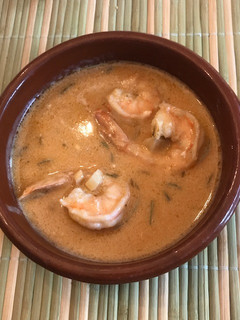Una foto de Camarones envinados