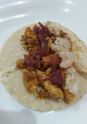 A picture of Pork Tacos with Onion Jam.