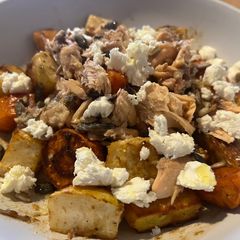 A picture of Roasted veggies salad with roasted garlic balsamic dressing.
