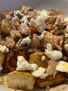 A picture of Roasted veggies salad with roasted garlic balsamic dressing.
