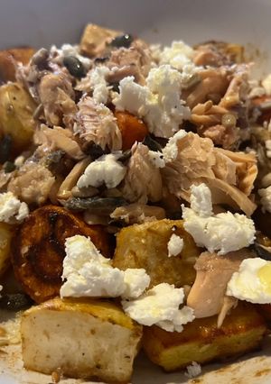 A picture of Roasted veggies salad with roasted garlic balsamic dressing.