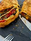 Stromboli with veggies, serrano ham and gorgonzola