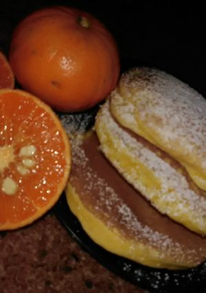 Una foto de Hotcakes de mandarina súper esponjosos