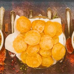 A picture of Instant Pot 🪁 Sankranti 🪁 Special♦️Undhiyu♦️with Carrom Seeds Ballooned Flatbread 🟠🟤.