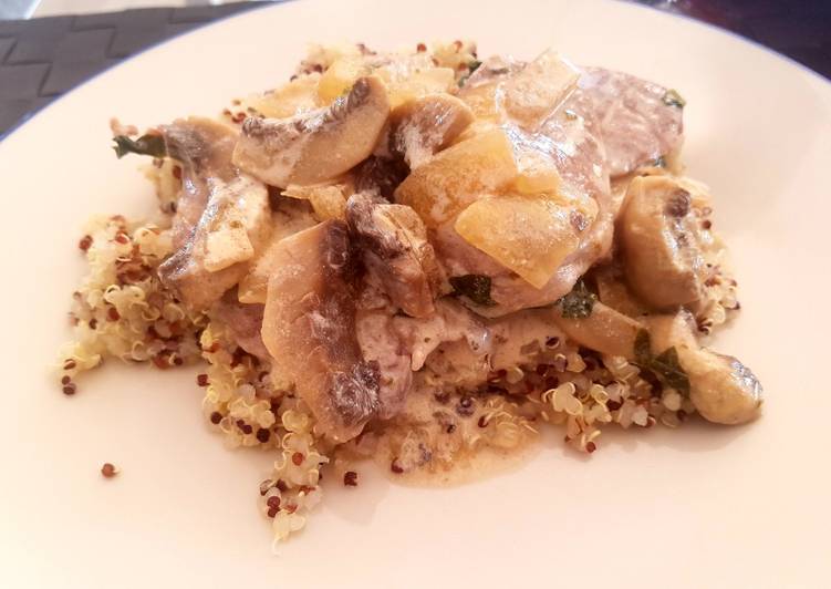 Lomo de cerdo ibérico en salsa de yogur y champiñones con quinoa