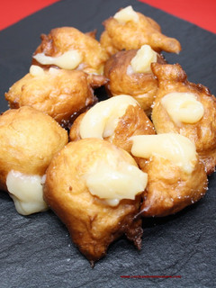 Una foto de Buñuelos de viento rellenos de crema pastelera