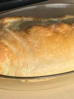 Una foto de Hojaldre salado de espinacas, piñones y coco