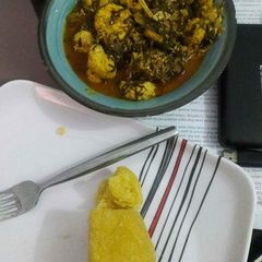A picture of Ofe okazi with achara and egusi balls.