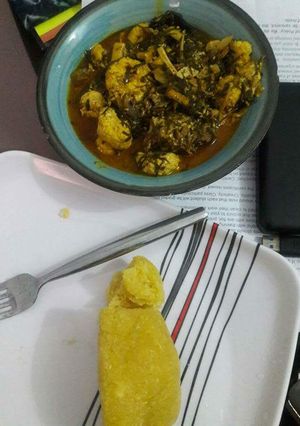 A picture of Ofe okazi with achara and egusi balls.