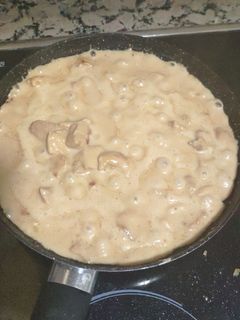 Una foto de Pollo con salsa de queso