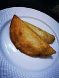 Empanaditas de atún guisado con queso rallado