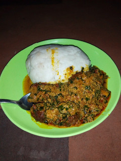 A picture of Pounded yam with egusi soup.