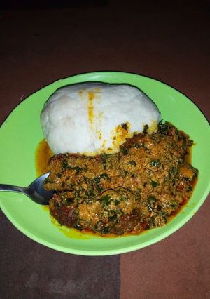 A picture of Pounded yam with egusi soup.