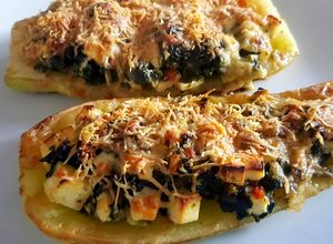 Una foto de Zucchini rellenos de espinaca y queso ricotta