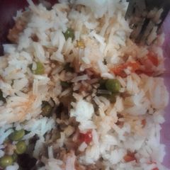 A picture of Stewed peas Served with Rice.