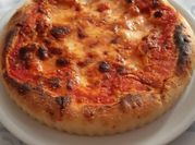 Una foto di pizza glutine