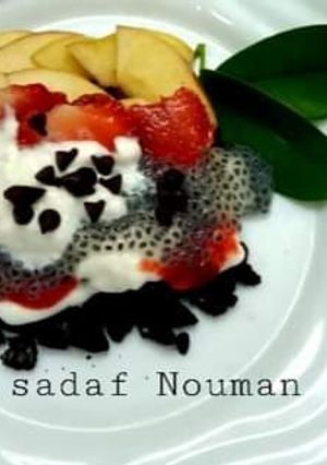 A picture of Fresh yogurt with fruit and chia seed.