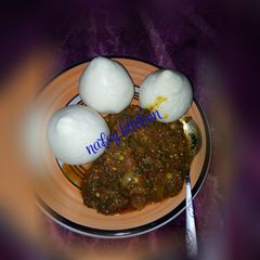 A picture of Pounded yam nd spinach soup.