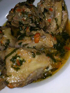 A picture of Chicken peppersoup with uziza leaf.
