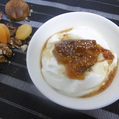 A picture of Yogurt dessert with a delicious topping.