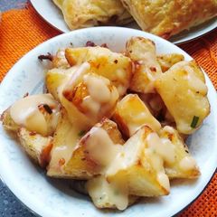 Roasted potatoes with mushroom sauce A picture of Roasted potatoes with mushroom sauce.