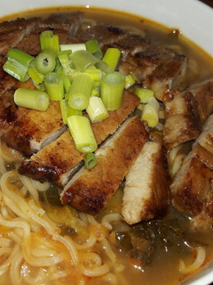 A picture of My super easy honey pork and sirracha ramen soup.