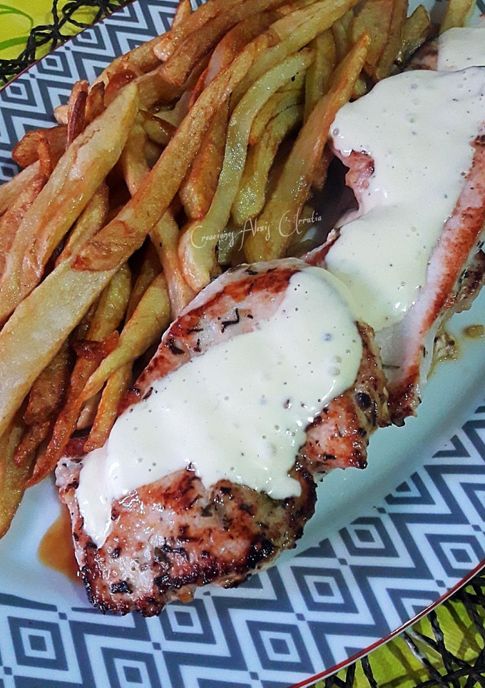 Una foto de Medallones de pavo con salsa fina de pimienta y cardamomo