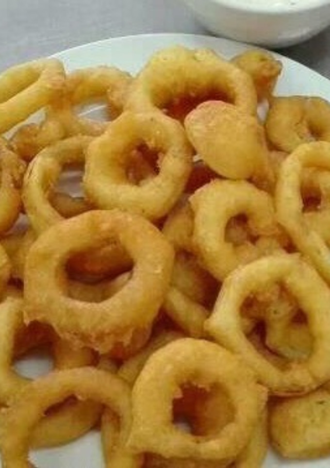 Una foto de Aritos de cebolla con salsa tártara