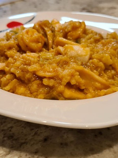 Una foto de Arroz con chipirones y gambas