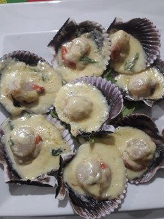 Una foto de Ostiones Parmesano
