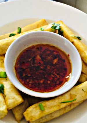 A picture of Peppered dip with Yam Fries.