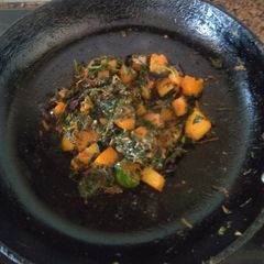 A picture of Amaranthus leaves along with veggies.