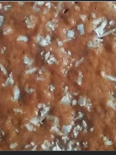 Una foto de Besitos De Coco Venezolanos (Versión Torta)