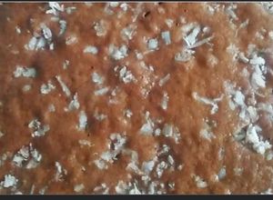 Una foto de Besitos De Coco Venezolanos (Versión Torta)