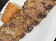 Una foto de costillas al horno crujientes